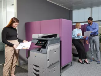 Colleagues using the Huddle space